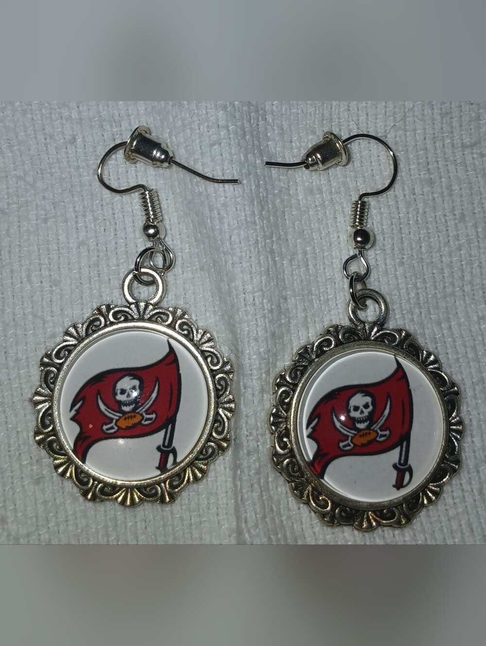 NWT Handcrafted Silver-Tone Red Pirate Flag Dangle Earrings.